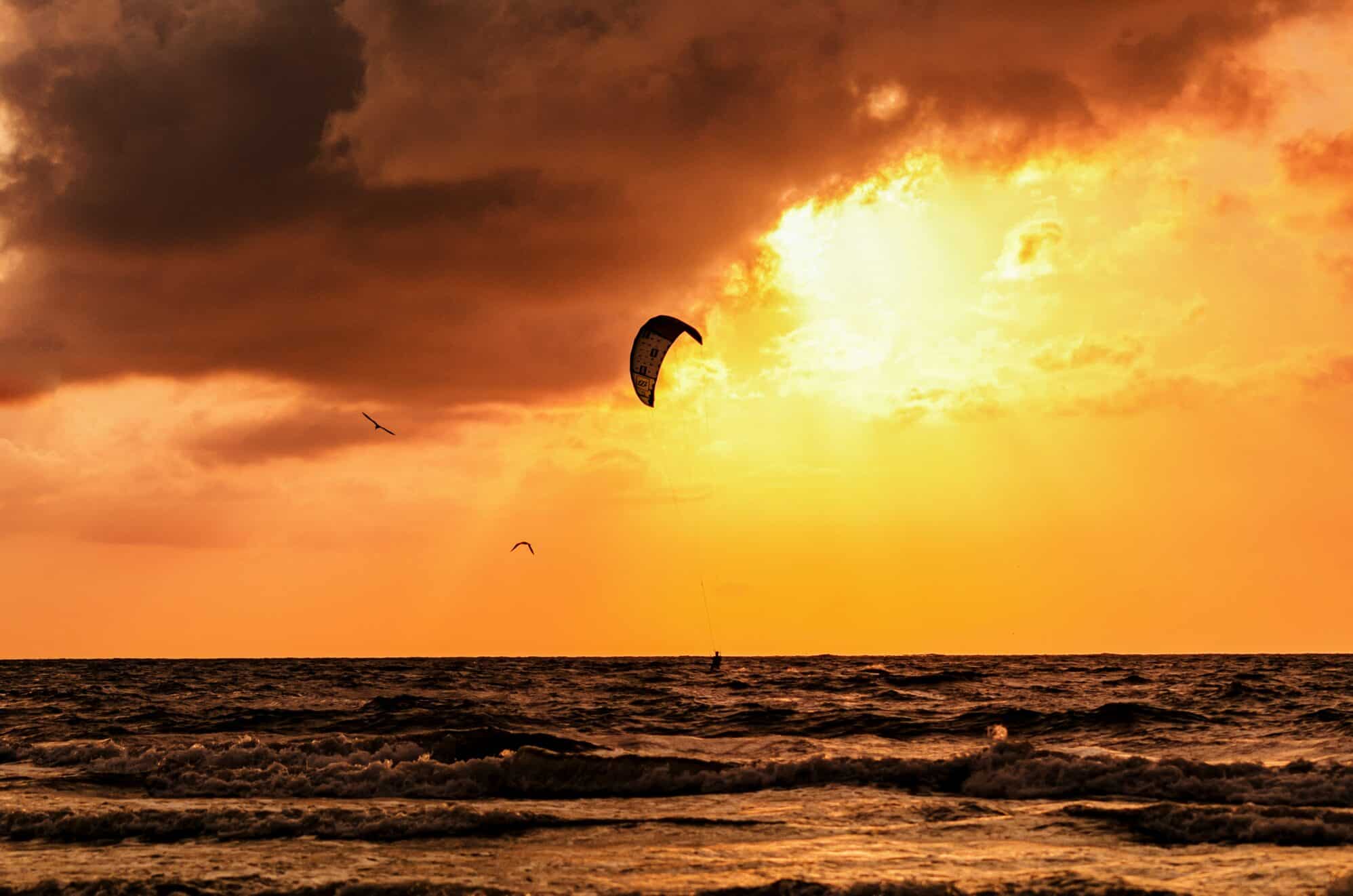 sunset with kite surfer